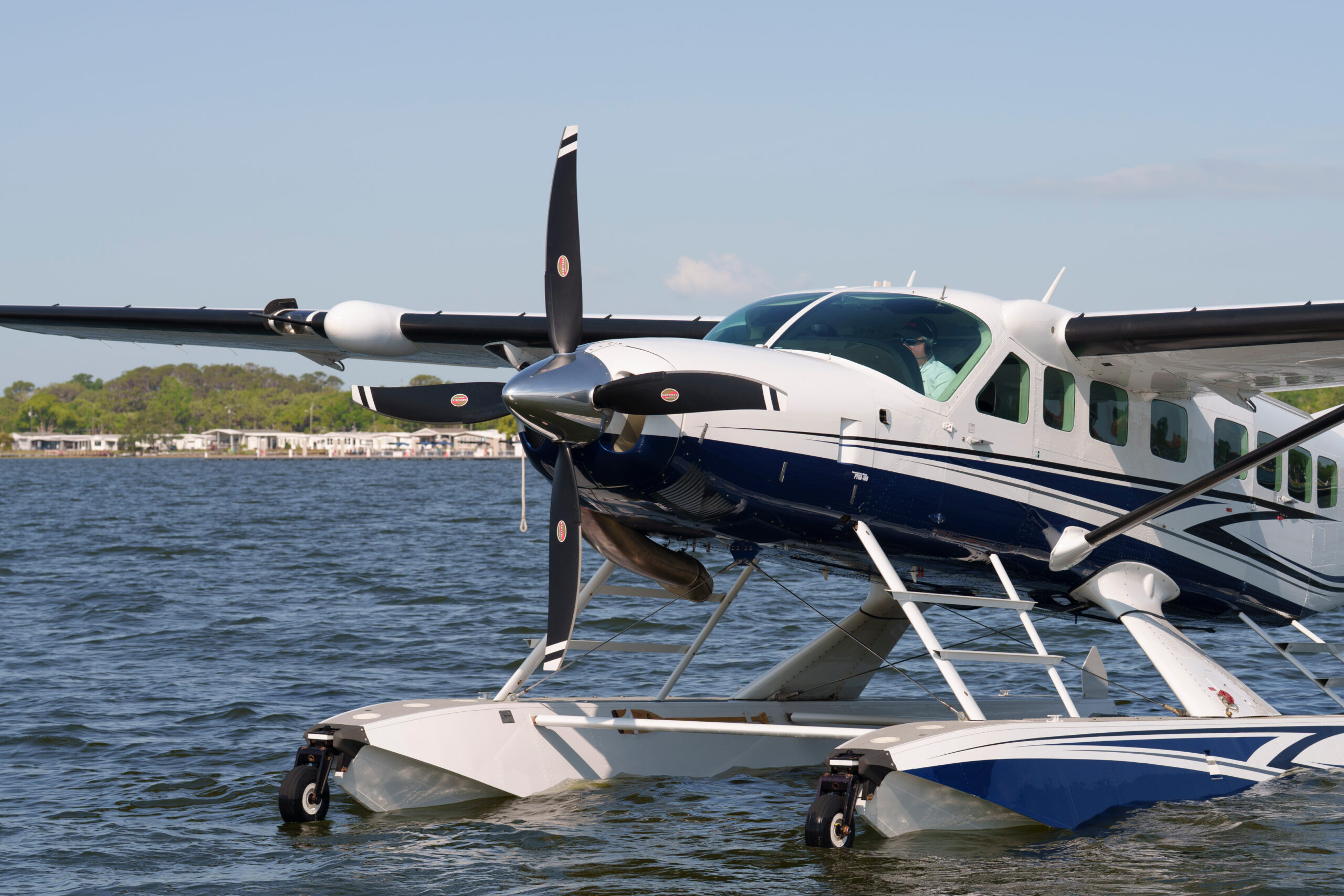 Caravan with Wipaire floats and Yukon propeller on water